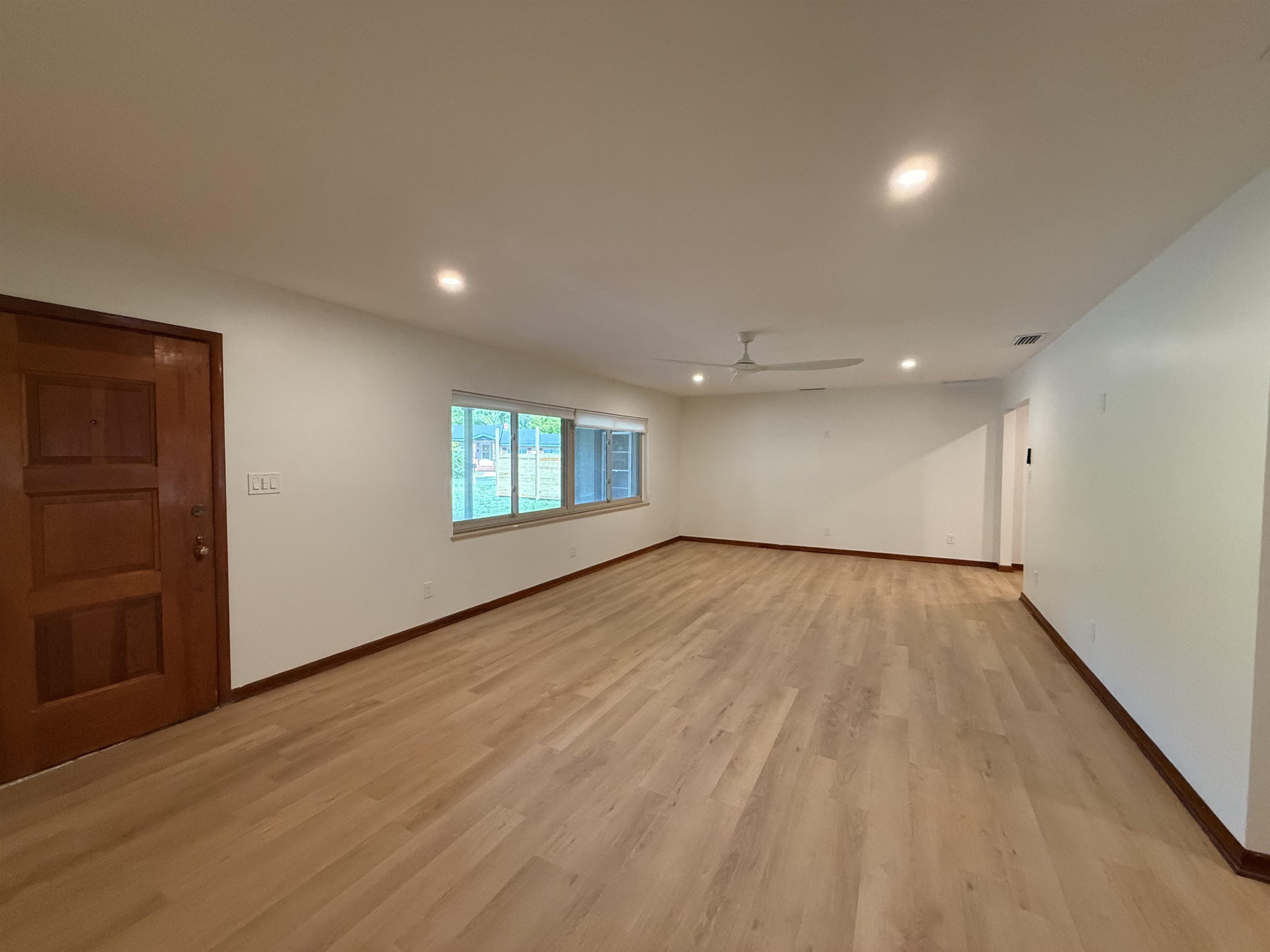378 El Rey Avenue, Unit MAIN HOUSE St. Augustine, FL 32084 - Photo 2 of 17 wooden floor in an empty room with a window