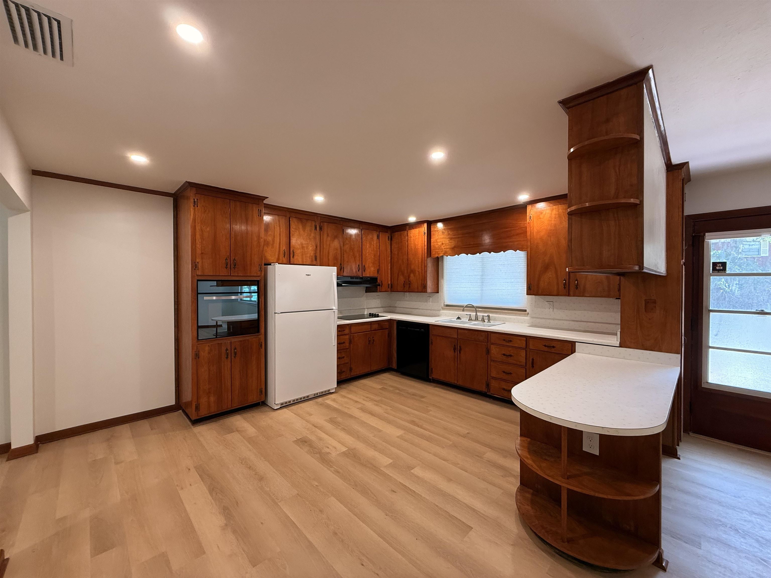 378 El Rey Avenue, Unit MAIN HOUSE St. Augustine, FL 32084 - Photo 4 of 17 a kitchen with a sink cabinets and wooden floor