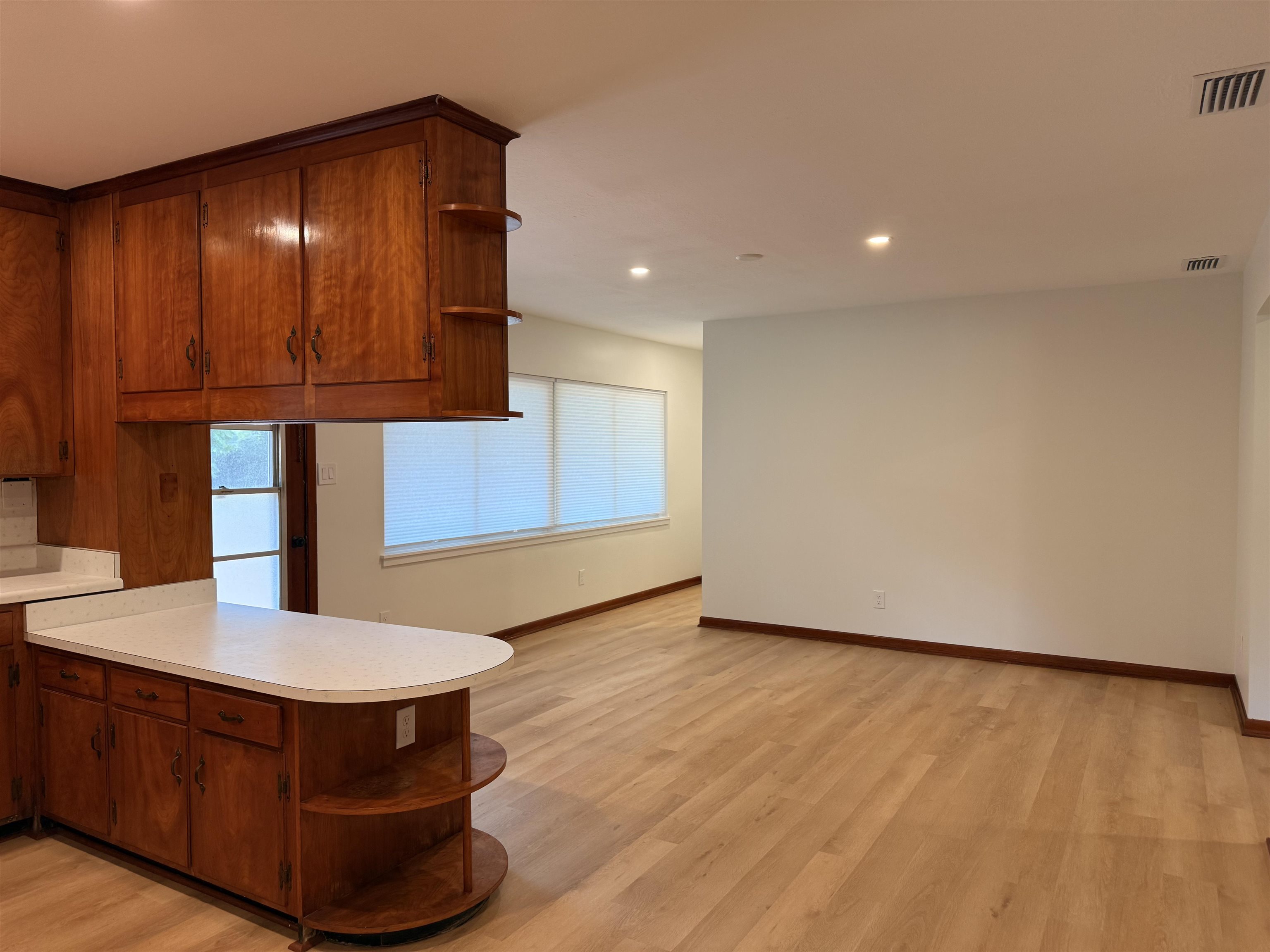 378 El Rey Avenue, Unit MAIN HOUSE St. Augustine, FL 32084 - Photo 5 of 17 a view of kitchen with cabinets and wooden floor