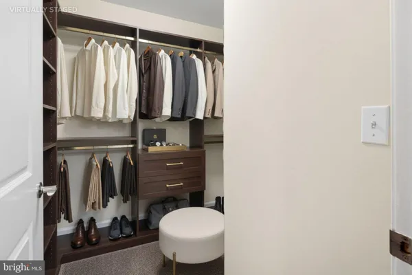 a bathroom with a toilet and a shower curtain
