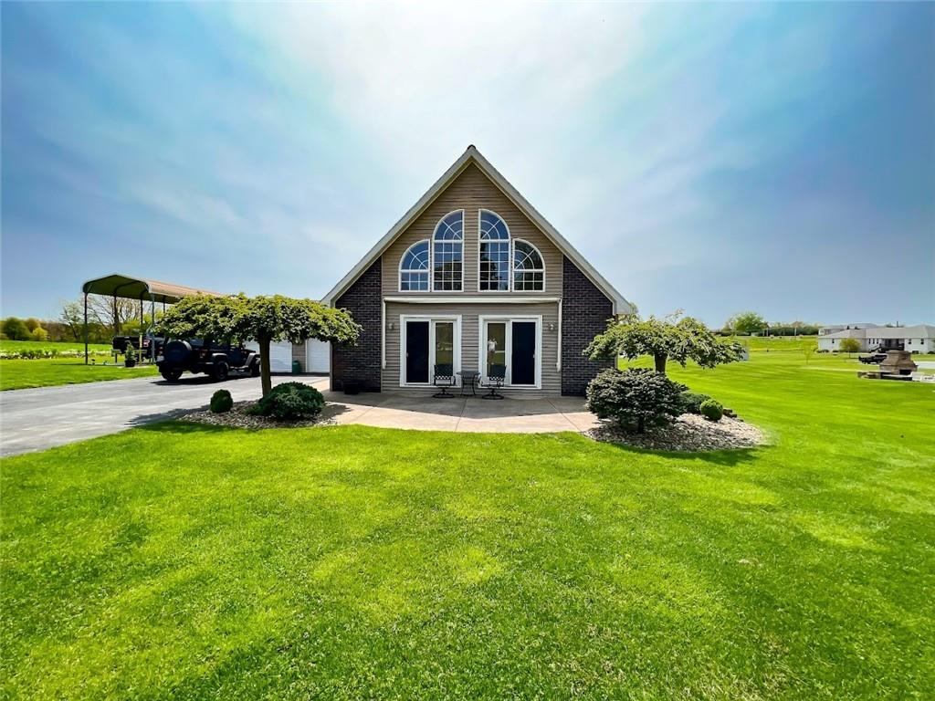 a front view of a house with a yard