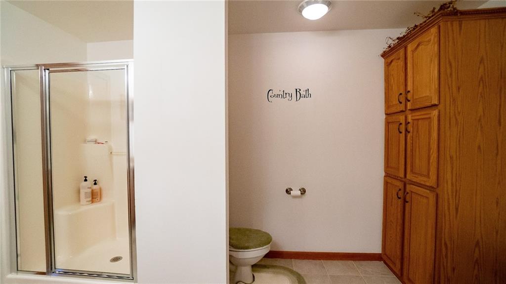201 Youkers Road Butler, PA 16001 - Photo 12 of 25 a bathroom with a shower and a toilet