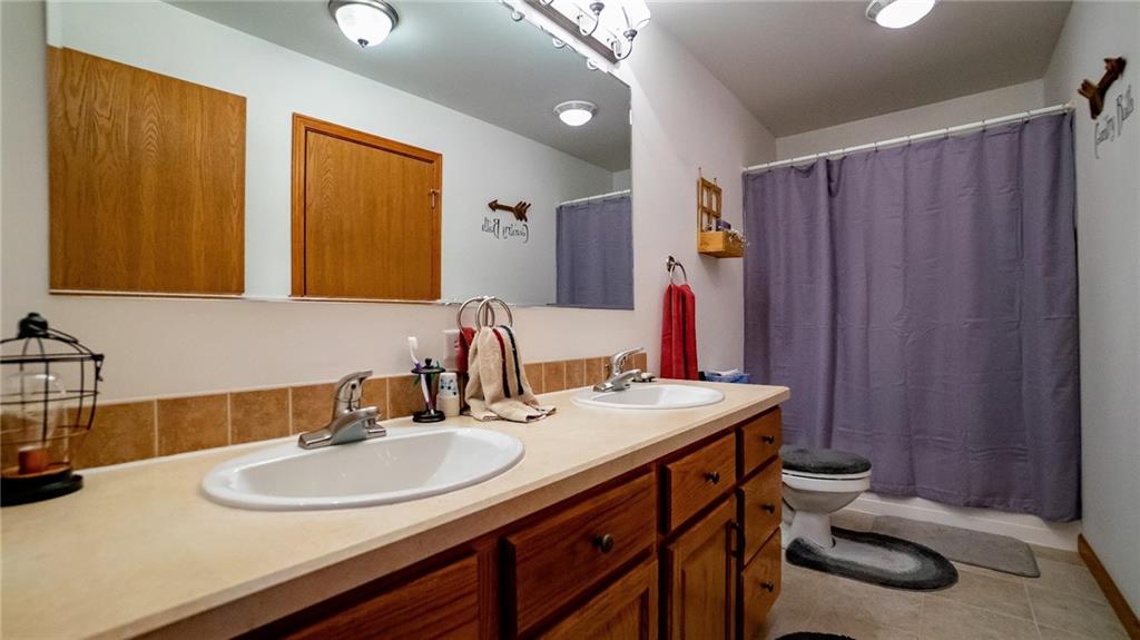 201 Youkers Road Butler, PA 16001 - Photo 15 of 25 a bathroom with a sink and a mirror