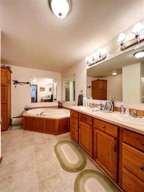 201 Youkers Road Butler, PA 16001 - Photo 18 of 25 a spacious bathroom with a tub sink and mirror