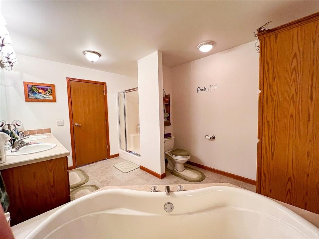 201 Youkers Road Butler, PA 16001 - Photo 19 of 25 a bathroom with a sink and a mirror