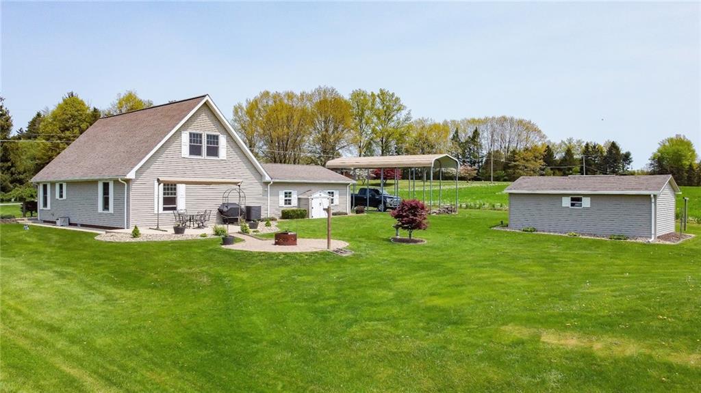201 Youkers Road Butler, PA 16001 - Photo 21 of 25 a view of a house with backyard and a sitting area