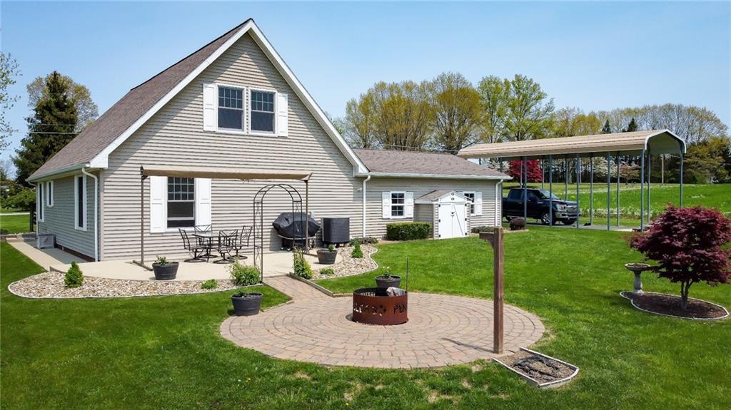 201 Youkers Road Butler, PA 16001 - Photo 22 of 25 a front view of house with a garden and patio
