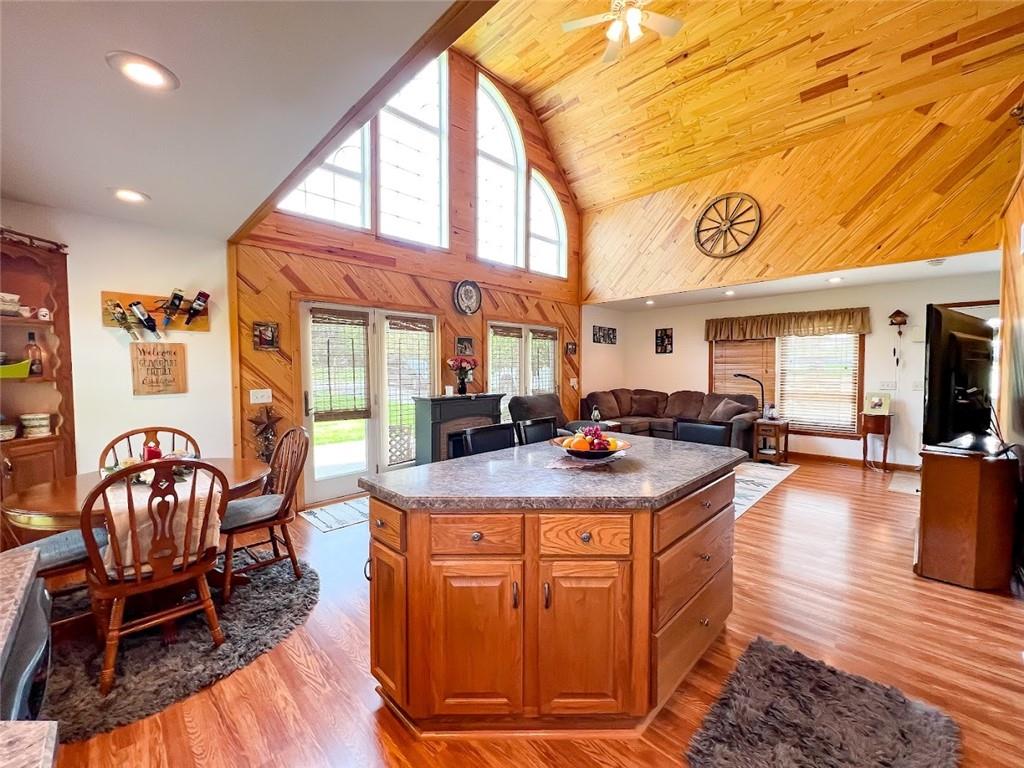 201 Youkers Road Butler, PA 16001 - Photo 5 of 25 a kitchen with stainless steel appliances granite countertop a stove and a dining table with garden view