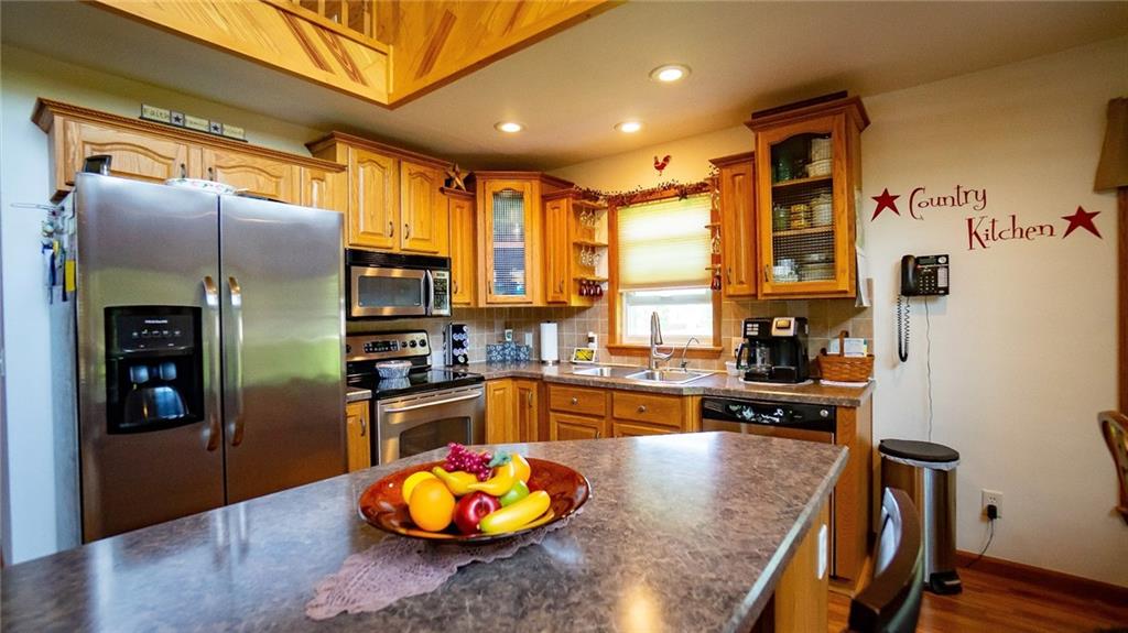 201 Youkers Road Butler, PA 16001 - Photo 7 of 25 a kitchen with stainless steel appliances granite countertop a refrigerator and a stove