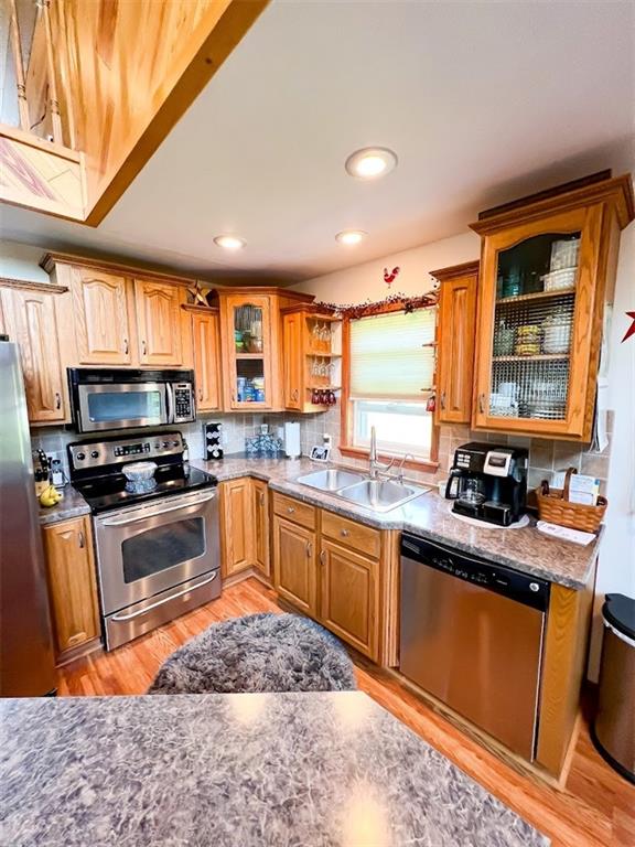 201 Youkers Road Butler, PA 16001 - Photo 8 of 25 a kitchen with stainless steel appliances granite countertop sink stove top oven and granite counter top