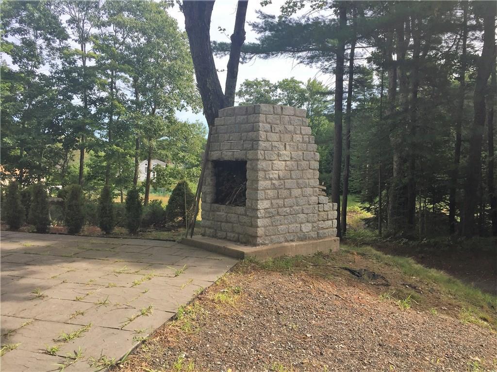 159 Middlesex Road Topsham, ME 04086 - Photo 24 of 26 Patio with wood-burning fireplace.