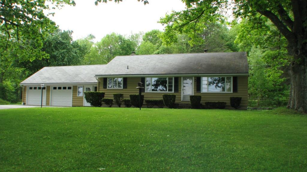 260 Weed Road Torrington, CT 06790 - Photo 1 of 1 a view of a house with a yard and sitting area