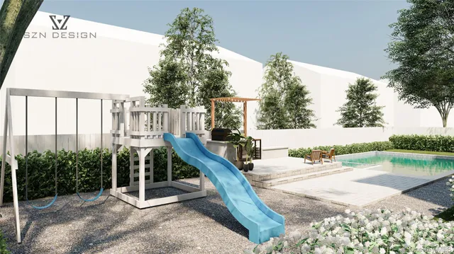 a view of a house with backyard and sitting area