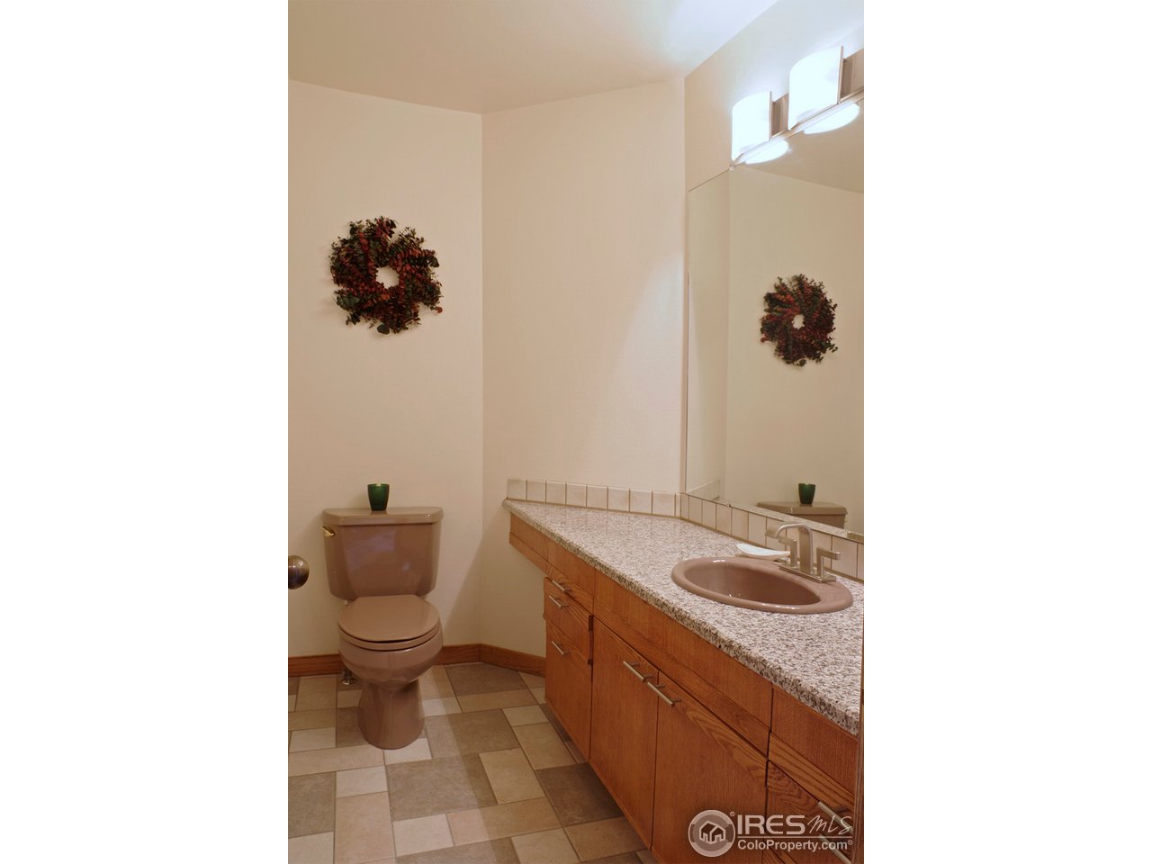 6220 Old Brompton Road Boulder, CO 80301 - Photo 11 of 25 a bathroom with a sink and mirror with toilet