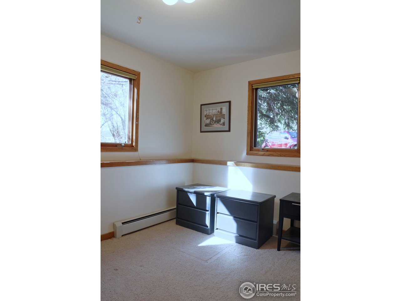 6220 Old Brompton Road Boulder, CO 80301 - Photo 18 of 25 a living room with furniture and a window