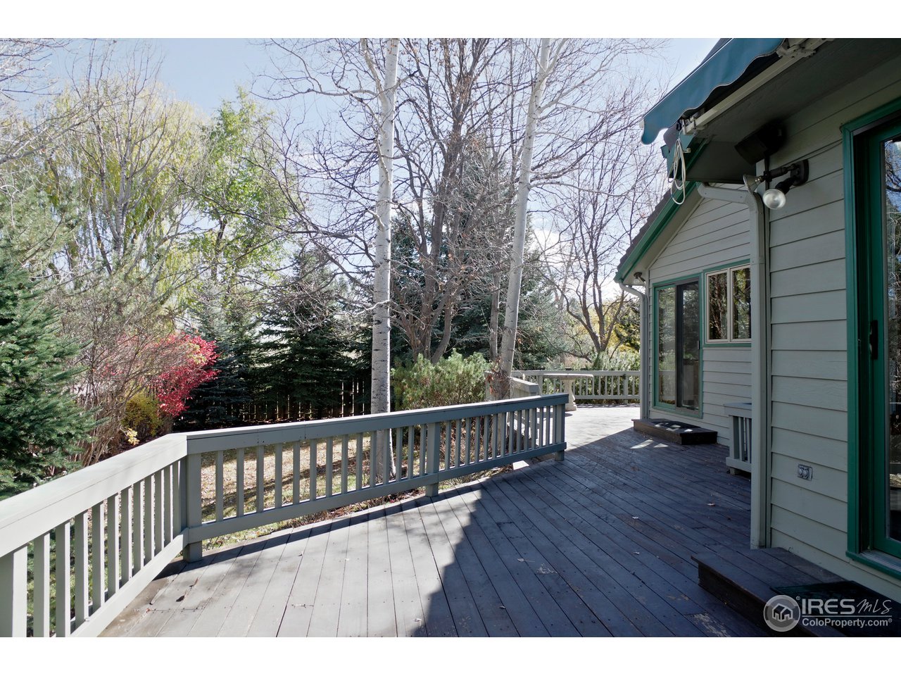 6220 Old Brompton Road Boulder, CO 80301 - Photo 23 of 25 a view of deck with wooden floor and seating space