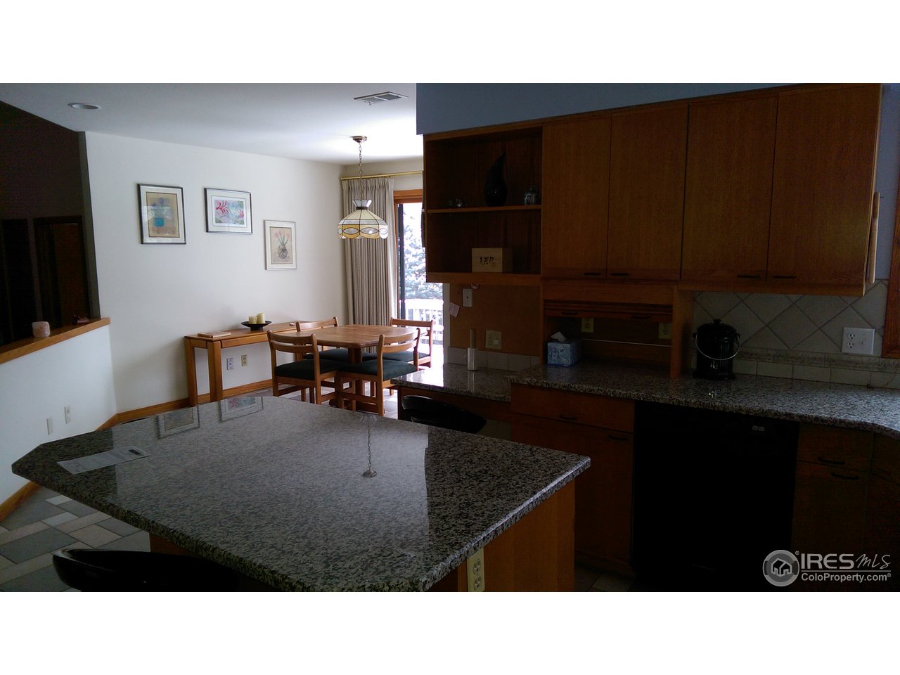 6220 Old Brompton Road Boulder, CO 80301 - Photo 7 of 25 a kitchen with a sink cabinets and chair