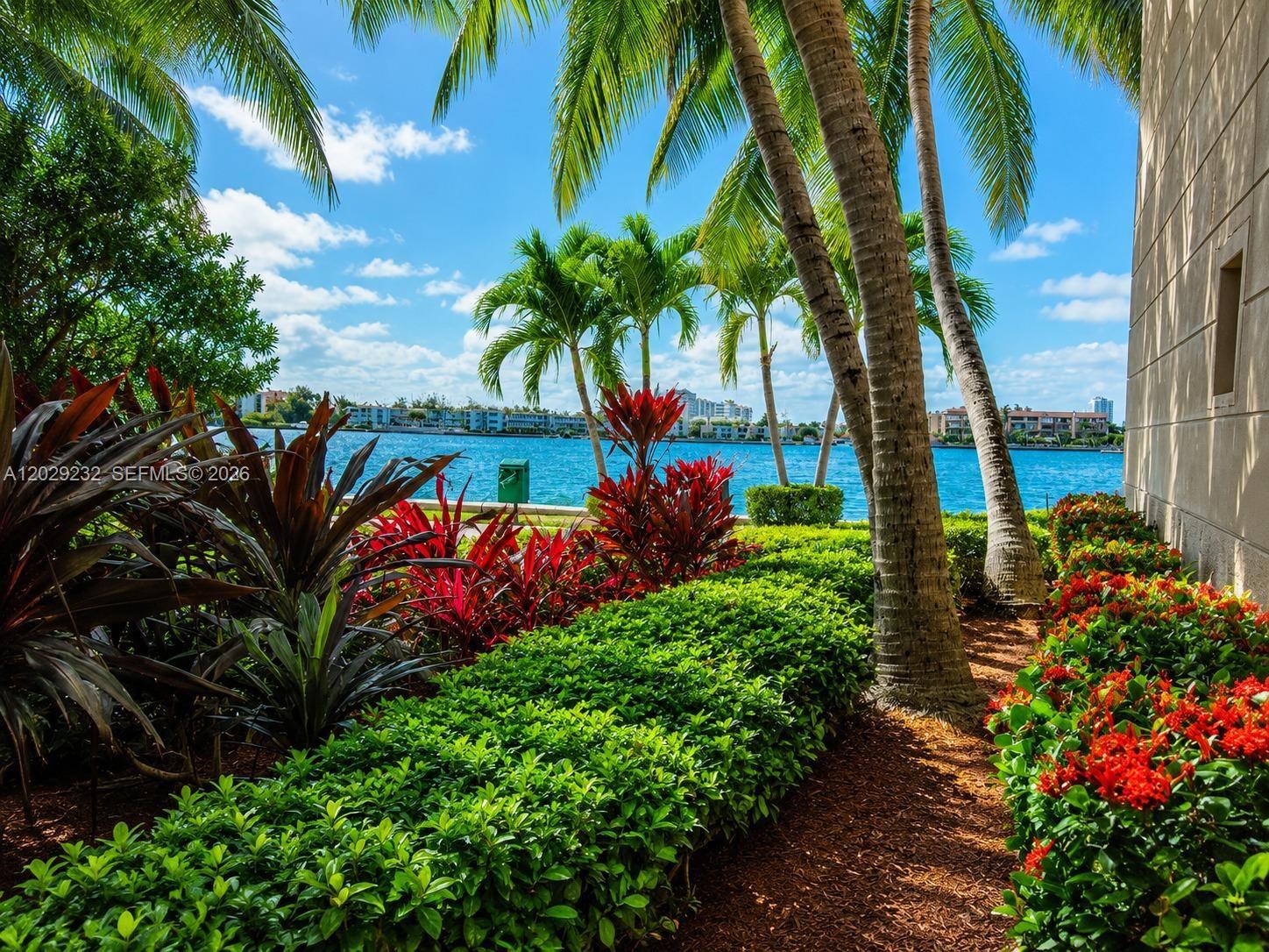 17100 North Bay Road, Unit 1605 Sunny Isles Beach, FL 33160 - Photo 36 of 52 a view of a garden with palm trees