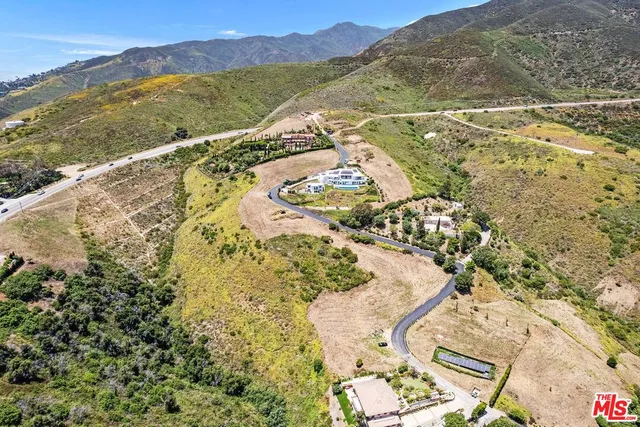 a view of a city with mountains in the background