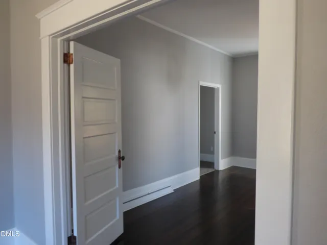 a stove top oven sitting inside of a kitchen