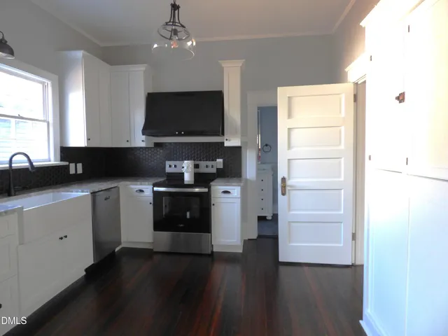 a view of a hallway with elevator