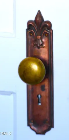 a bathroom with a shower a sink and a mirror