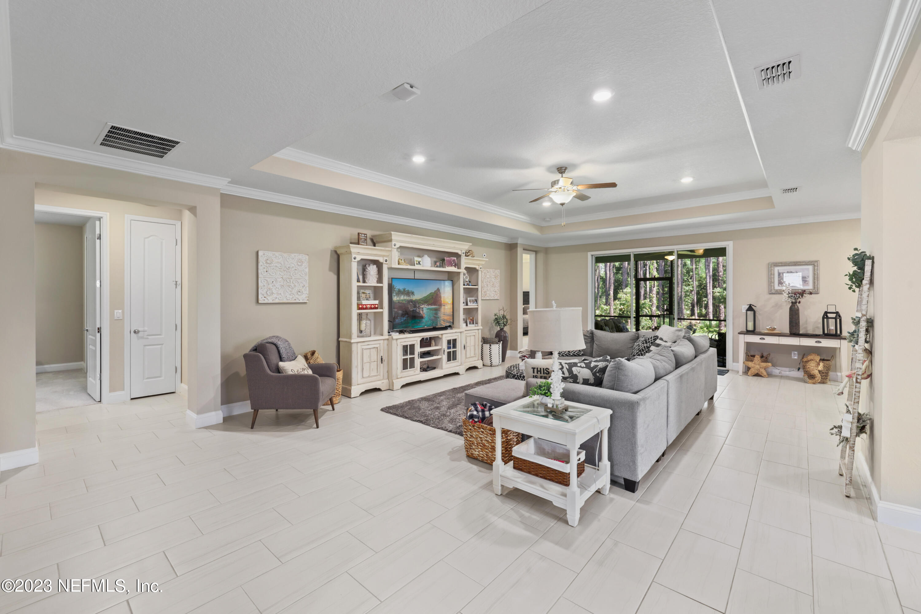 370 Coco Point St. Augustine, FL 32092 - Photo 16 of 48 a living room with furniture and a table