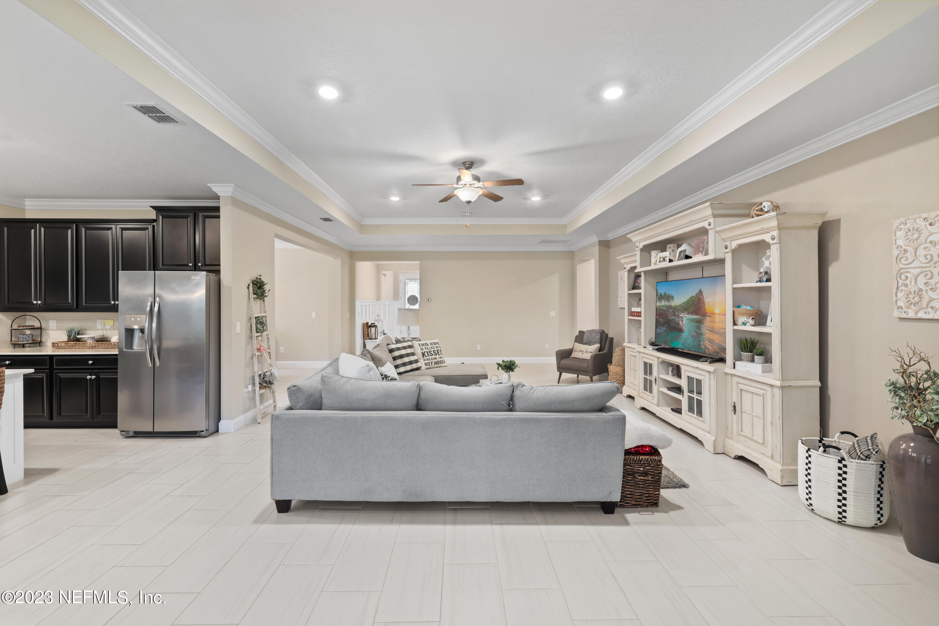 370 Coco Point St. Augustine, FL 32092 - Photo 18 of 48 a living room with furniture and a flat screen tv