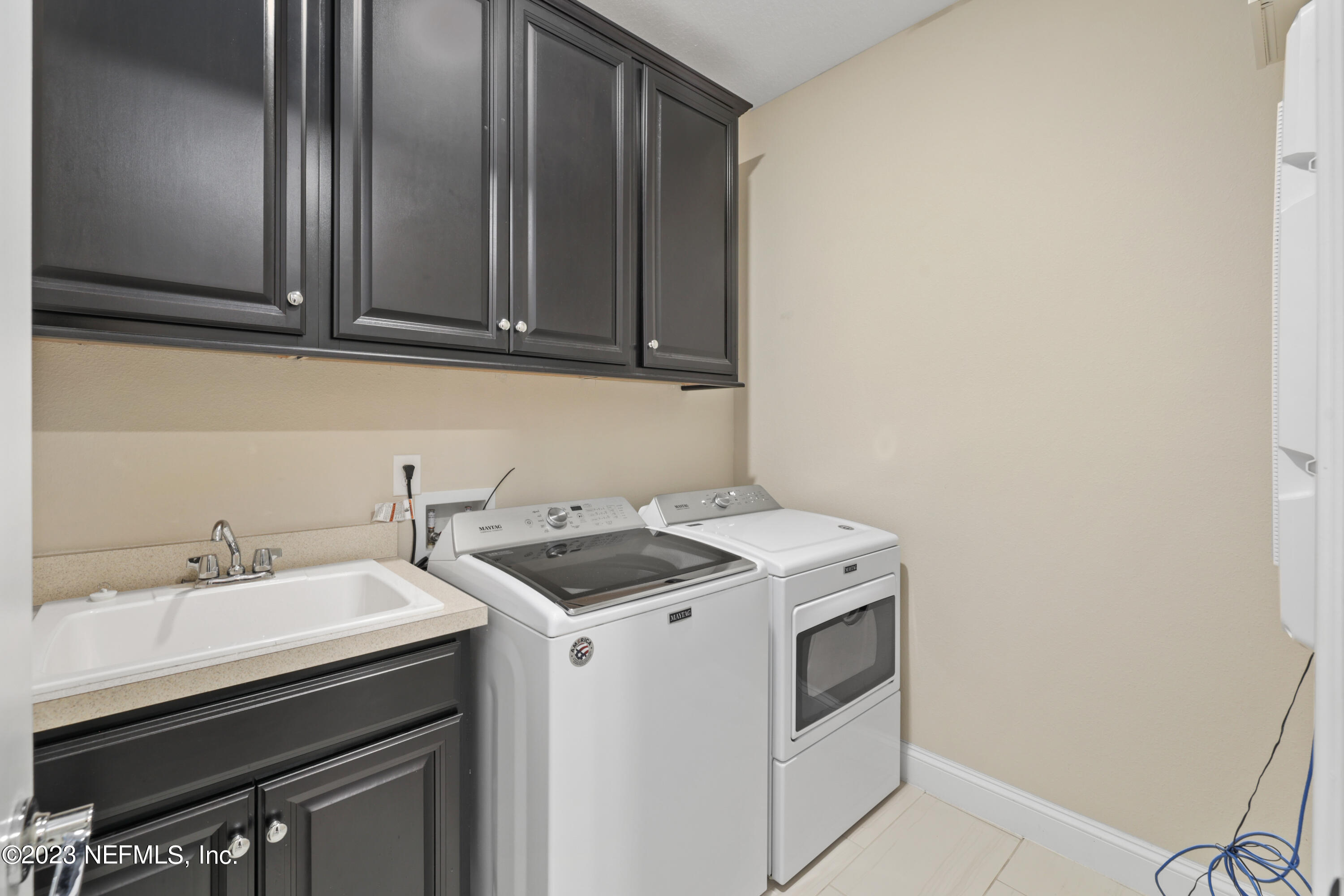 370 Coco Point St. Augustine, FL 32092 - Photo 30 of 48 a utility room with dryer and washer