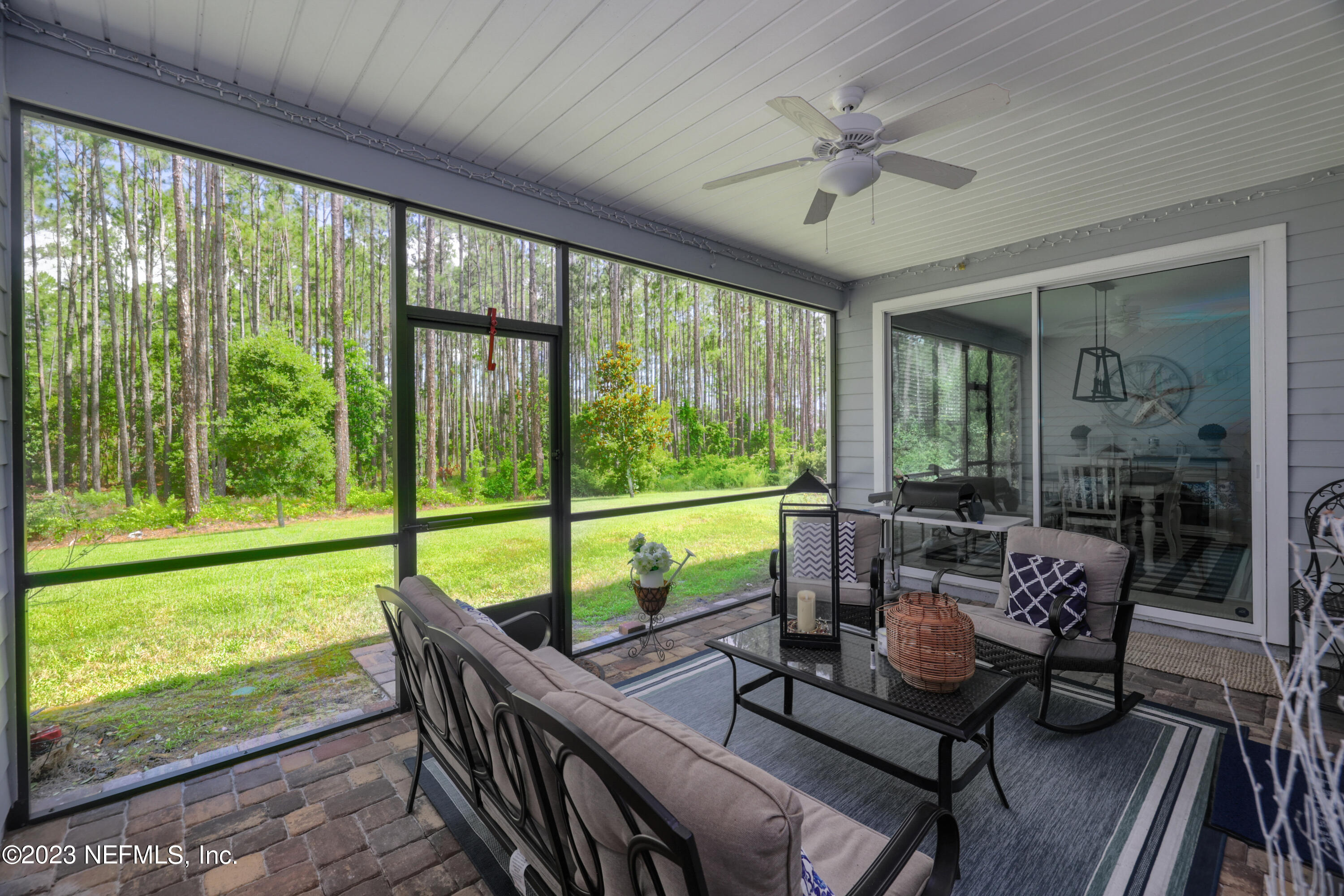 370 Coco Point St. Augustine, FL 32092 - Photo 33 of 48 a living room with hardwood floor and windows