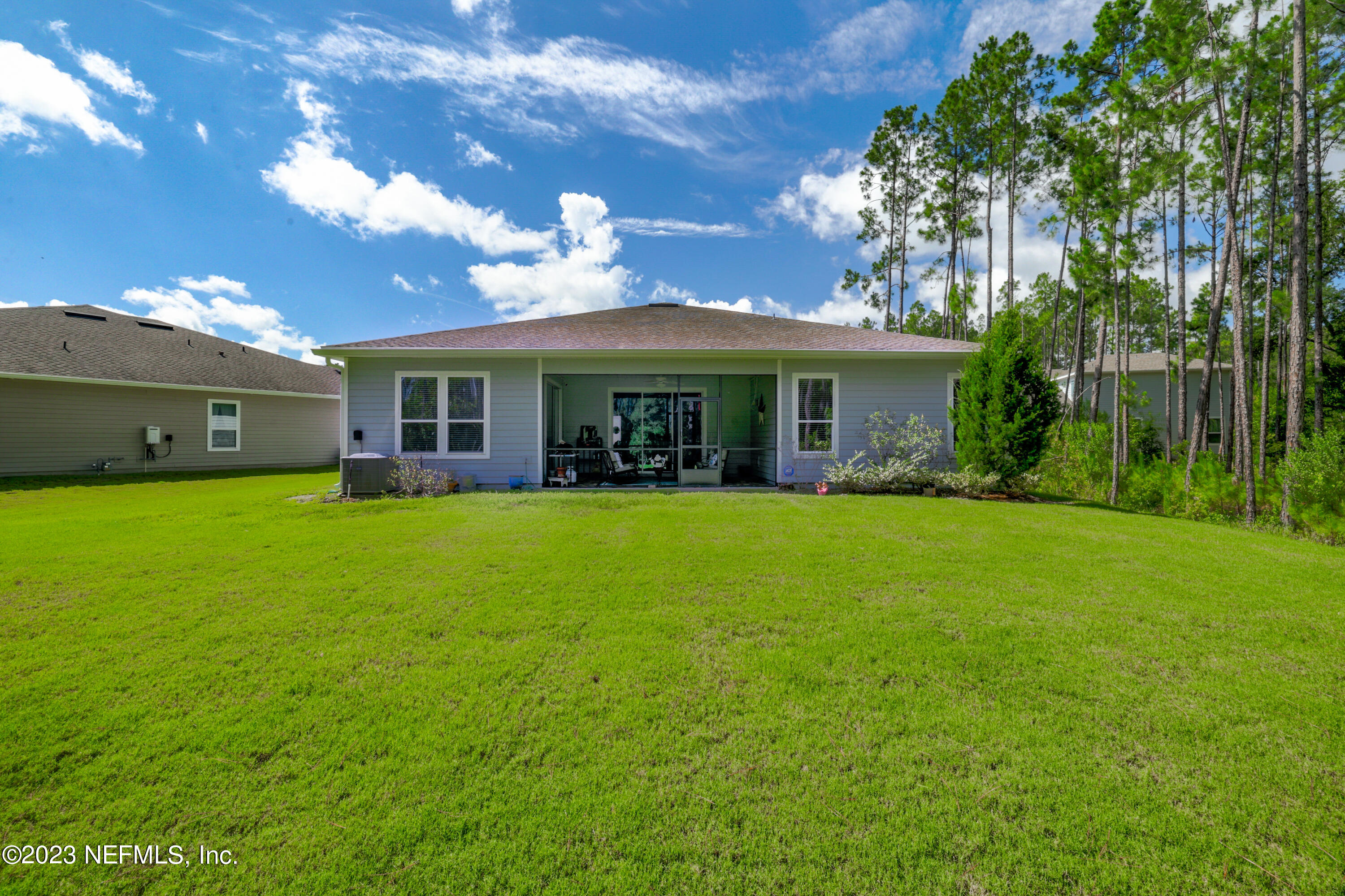 370 Coco Point St. Augustine, FL 32092 - Photo 34 of 48 a view of house that has a garden