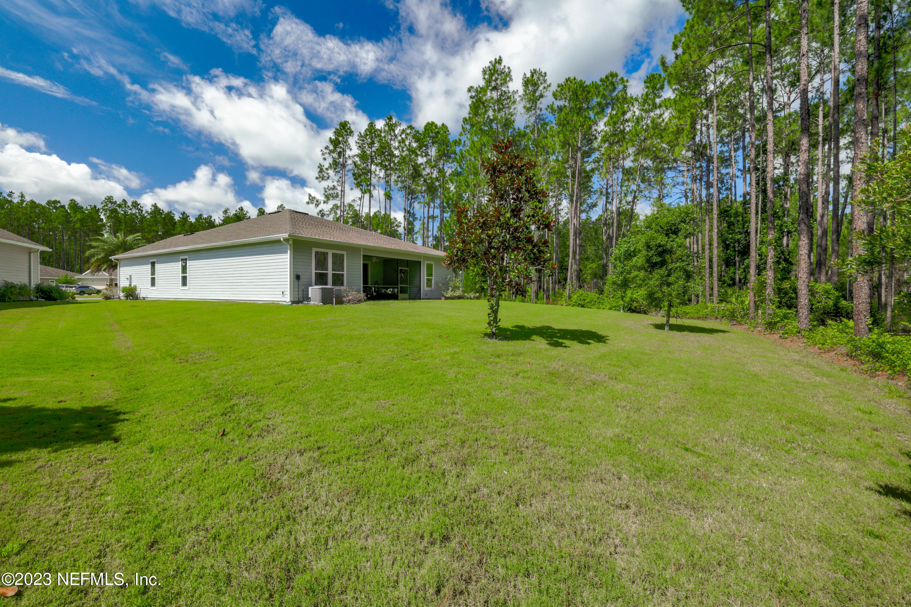 370 Coco Point St. Augustine, FL 32092 - Photo 35 of 48 a view of a house with a backyard