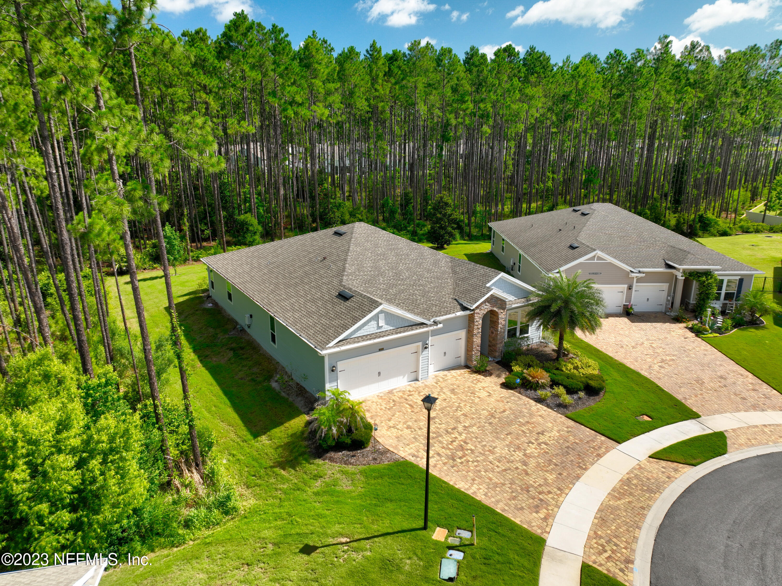 370 Coco Point St. Augustine, FL 32092 - Photo 39 of 48 an aerial view of a house with swimming pool and green space