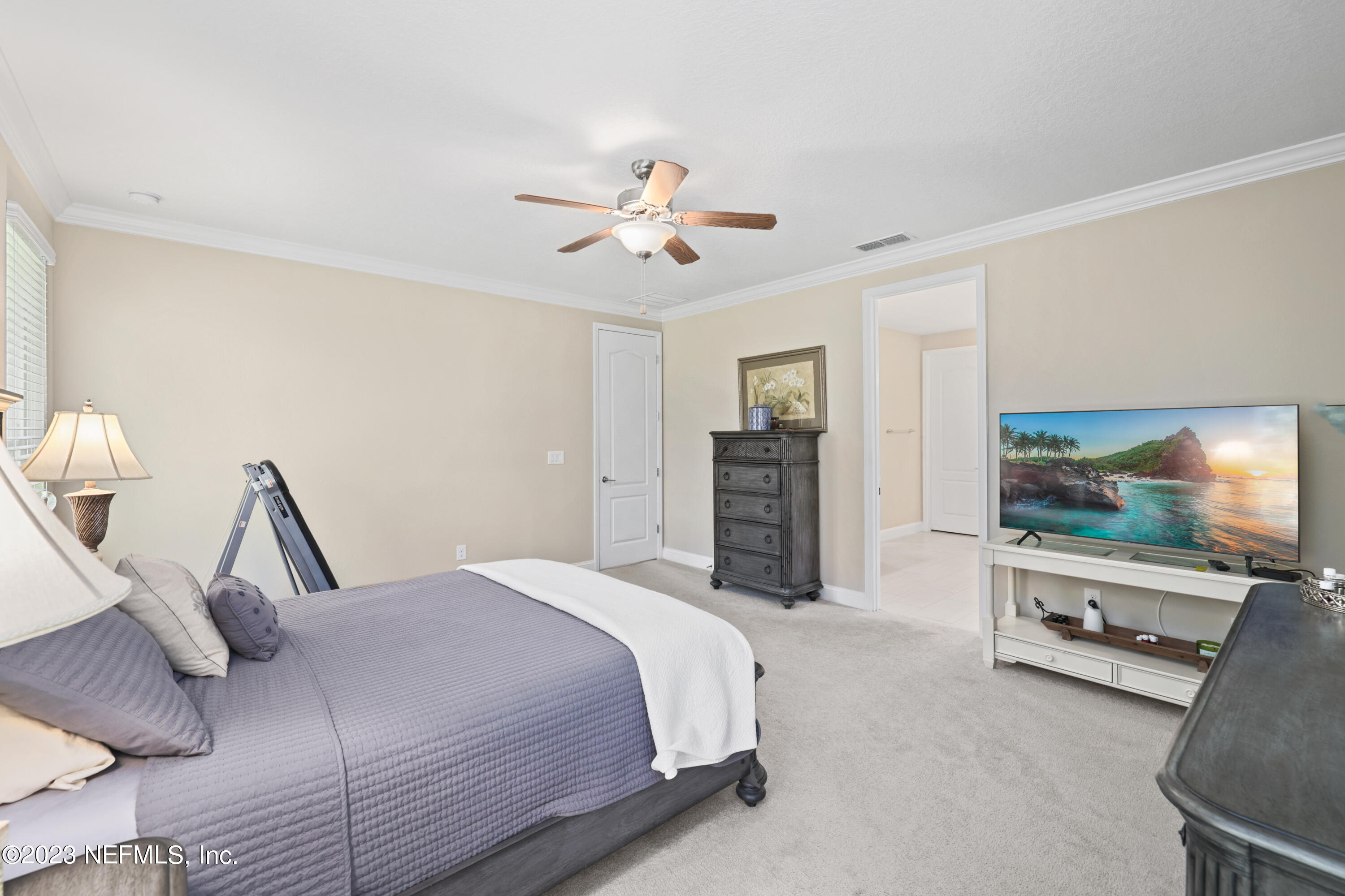 370 Coco Point St. Augustine, FL 32092 - Photo 4 of 48 a bedroom with a bed and a flat screen tv
