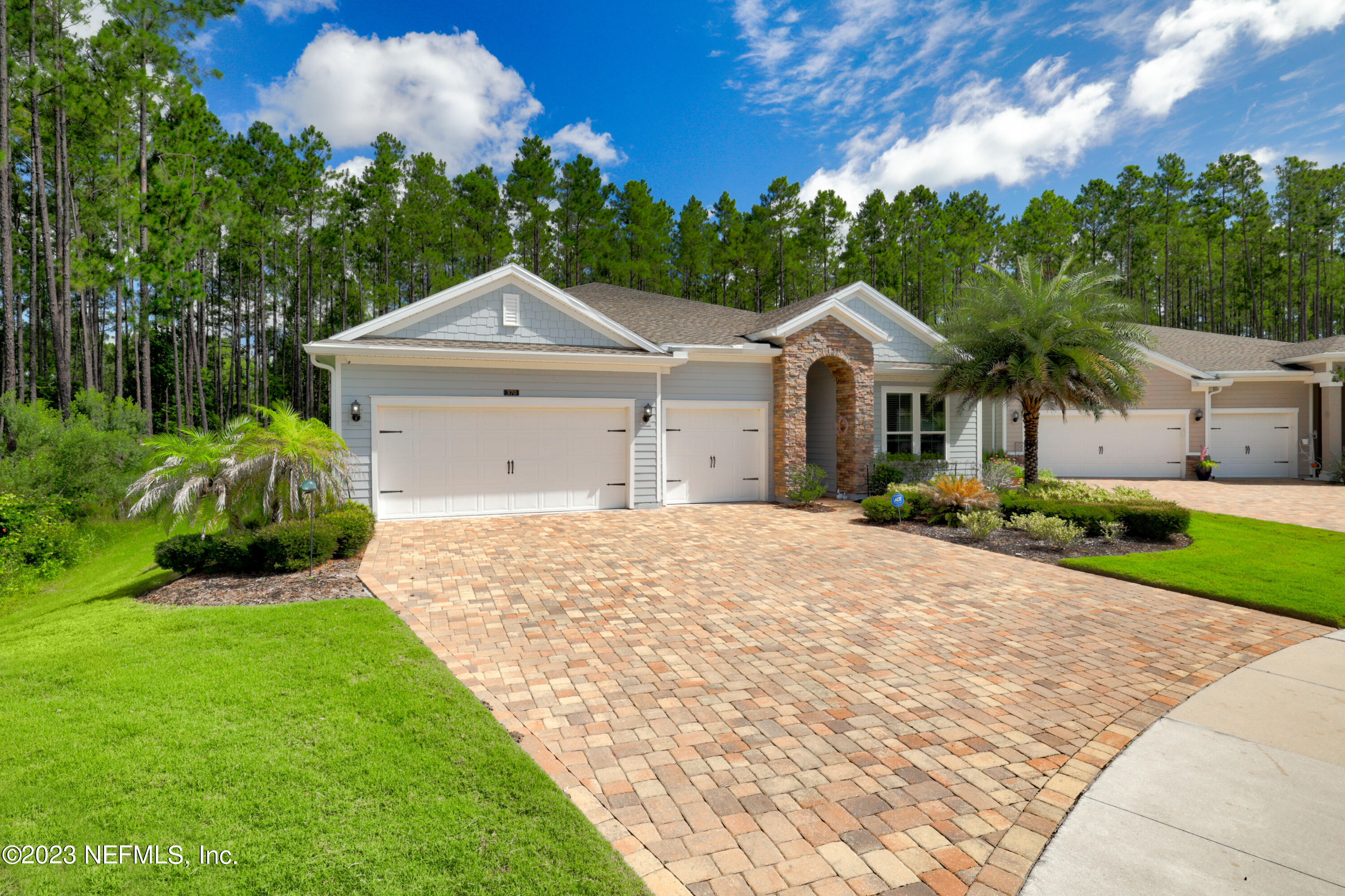 370 Coco Point St. Augustine, FL 32092 - Photo 41 of 48 a front view of a house with garden