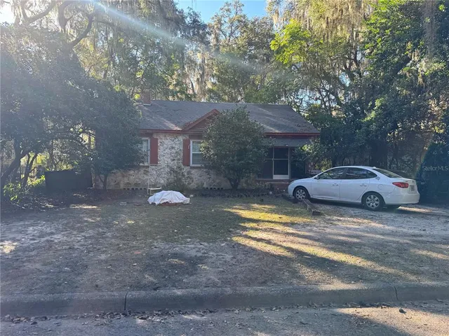 a view of a yard in front of a house