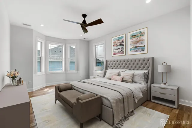 a bathroom with a toilet sink and shower