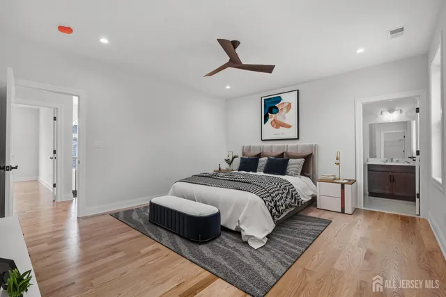 a view of a house with backyard and a tree