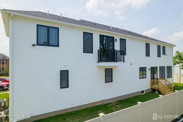 a kitchen with stainless steel appliances a stove sink and cabinets