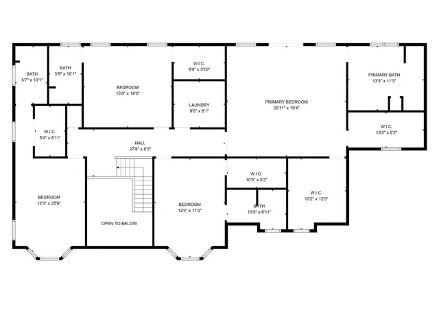 a view of a room with wooden floor and white walls