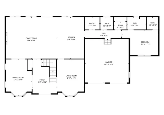 a view of empty room with wooden floor and window