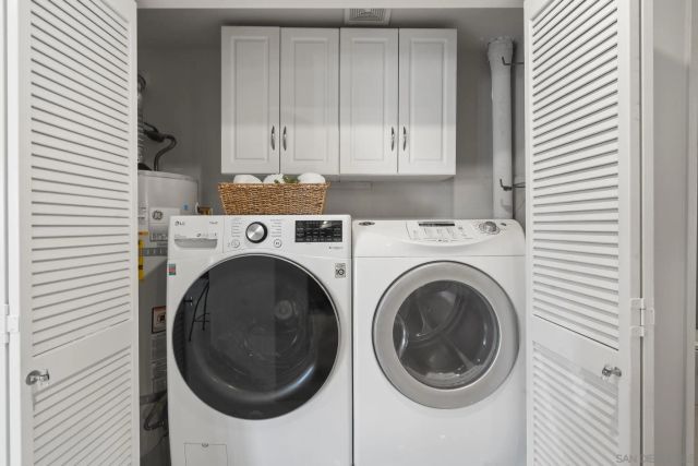 a view of a balcony with furniture