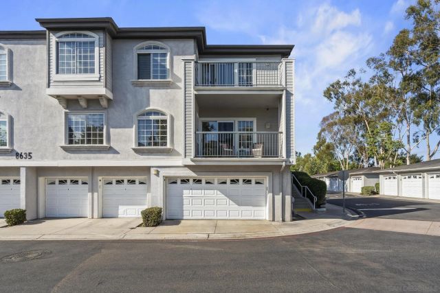 a front view of a building with a street