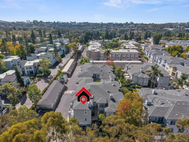 an aerial view of a city with lots of residential buildings