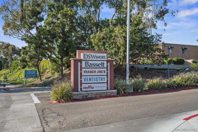 a view of a street in front of a building