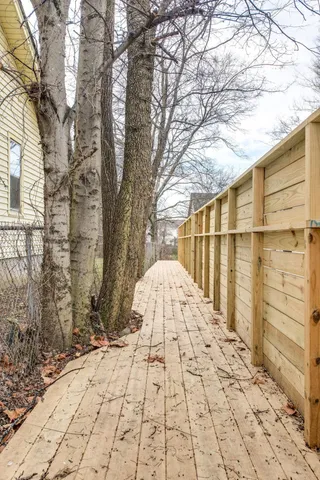 a view of a backyard of the house