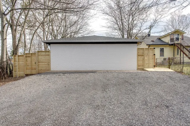 a house that has tree in front of it