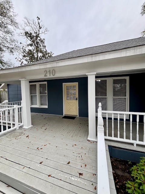 210 East Phillips Street Conroe, TX 77301 - Photo 2 of 27 a house view with a outdoor space