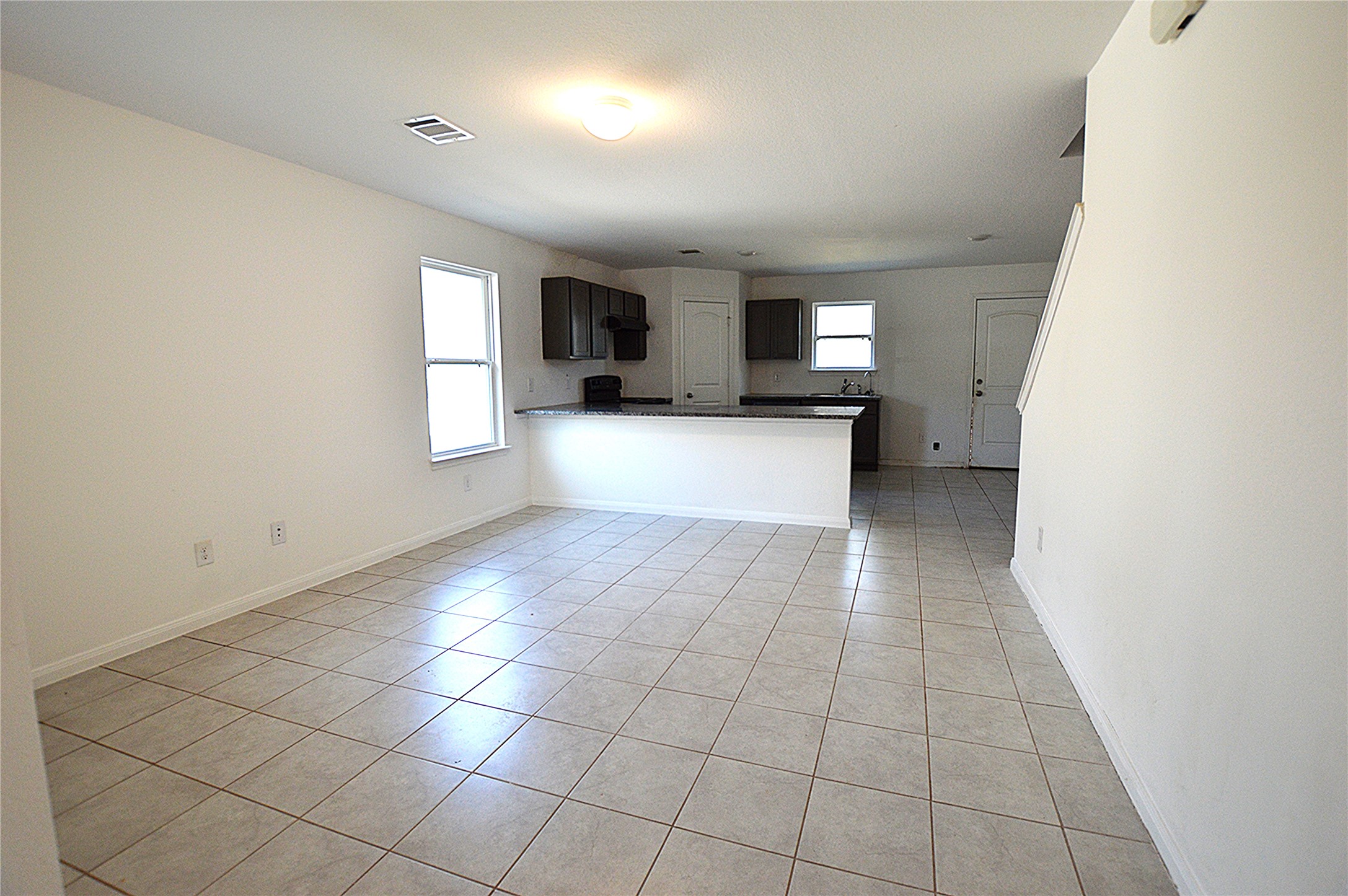 3059 Caddo Willis, TX 77378 - Photo 11 of 27 a view of a kitchen with a sink and a window