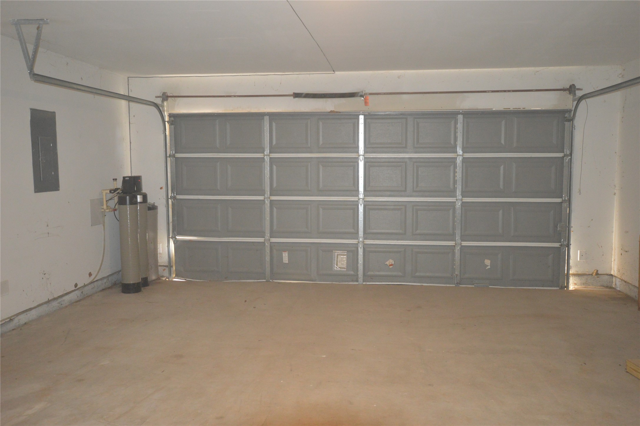 3059 Caddo Willis, TX 77378 - Photo 24 of 27 a view of an empty room with empty shelves